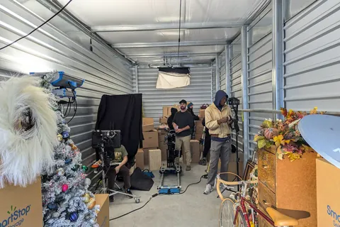 The crew lighting a storage-unit set for SmartStop